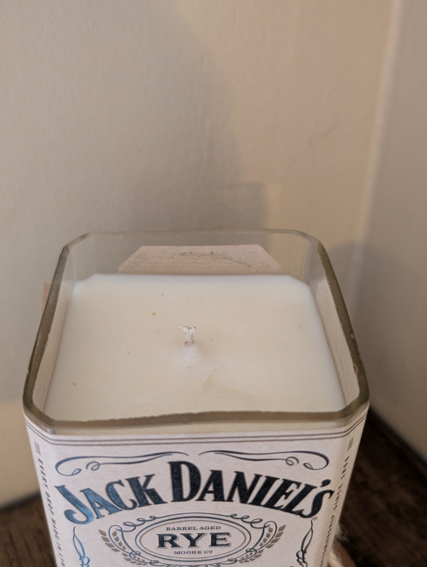 Whiskey bottle candle